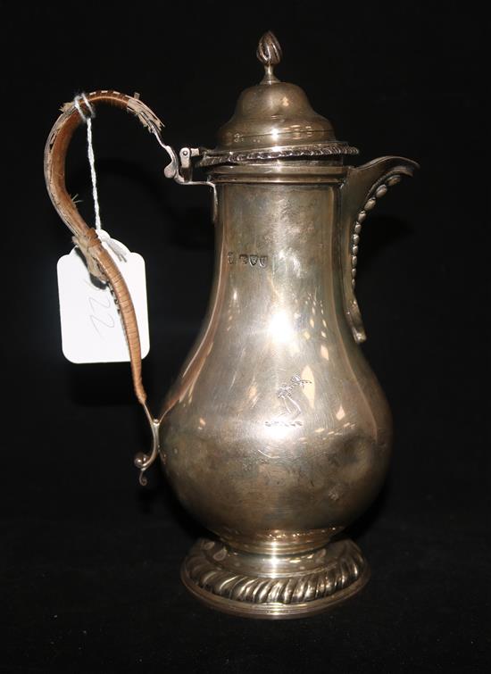 A late Victorian George III design silver baluster hot water jug, Charles Stuart Harris, London 1895, gross 16 oz.